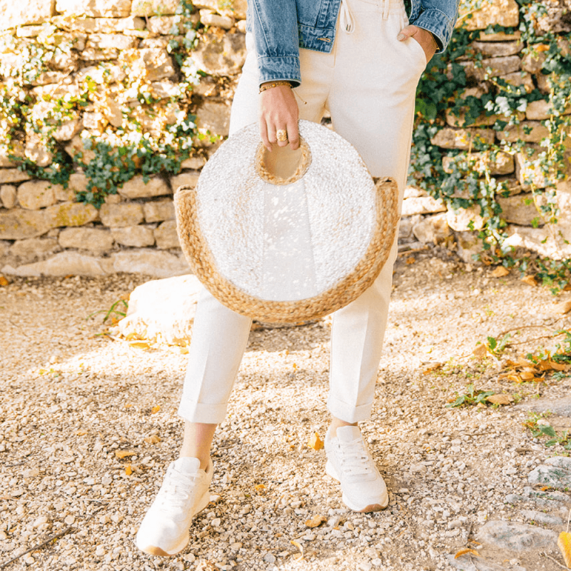 Sac forme ronde en paille et motif doré