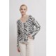 Pull doux motif zèbre écru et noir