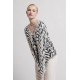 Pull doux motif zèbre écru et noir