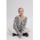 Pull doux motif zèbre écru et noir