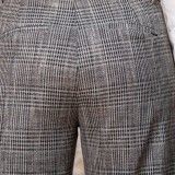Pantalon large à carreaux en gabardine stretch