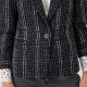 Veste de tailleur en tweed à carreaux noir et blanc