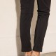 Pantalon noir coupe carotte et poches décoratives